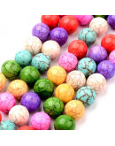 Turquesa sintética. Colores variados. 12 mm diámetro. 1,50 mm perforación. 15 uds hilo (aprox.)