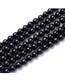 Jade. Negro. 06 milímetros diámetro. 1 mm perforación. 60 unidades hilo (aproximado) Jade. Negro. 06 milímetros diámetro. 1 mm perforación. 60 unidades hilo (aproximado)