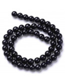 Jade. Negro. 06 milímetros diámetro. 1 mm perforación. 60 unidades hilo (aproximado) Jade. Negro. 06 milímetros diámetro. 1 mm perforación. 60 unidades hilo (aproximado)