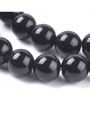 Jade. Negro. 10 milímetros diámetro. 1 mm perforación. 35 unidades hilo (aproximado) Jade. Negro. 10 milímetros diámetro. 1 mm perforación. 35 unidades hilo (aproximado)