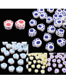 Huellas de perro. Varios colores. 9X10X5 milímetros. 1,2 mm de perforación. 10 unidades.