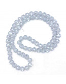 Opaco y brillante. Celeste y plateado arcoiris. 4,5 mm. 1 mm perforación. 100 uds hilo (aprox).