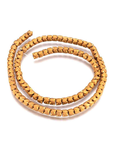 Hematite sintético. Corona dorada. Frost. 5x4 milímetros. 1 mm perforación. 100 uds hilos (aprox).