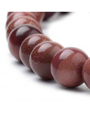 Aventurina café. 06 milímetros diámetro. 1 mm perforación. 60 unidades hilo (aproximado).