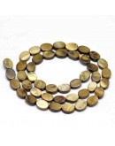 Concha de mar. Ovalado. Color café. 8x6x6 milímetros. 1 mm perforación. 45 uds hilo (aproximado).