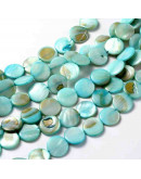 Concha de mar. Monedas. Celeste. 14 mm diámetro. 2 mm perforación. 28 uds hilo (aproximado).