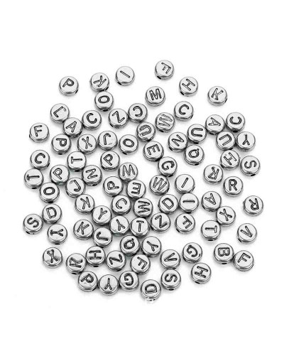 Letra negra. Moneda plateada. 7 mm diámetro. 1,5 mm perforación. 100 uds aproximado.