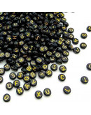 Letra dorada. Moneda negra. 7 milímetros diámetro. 1,5 mm perforación. 100 uds aproximado.