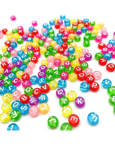 Letra blanca. Moneda transparente multicolor. 7 mm diámetro. 1,5 mm perforación. 100 uds aproximado.