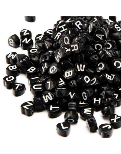 Letra blanca. Corazón negro. 7 milímetros lado. 1,5 mm perforación. 100 unidades aproximado.