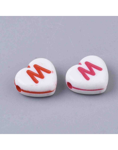 Letra varios colores. Corazón blanco. 10x11x5 milímetros. 1,8 mm perforación. 35 uds aproximado.