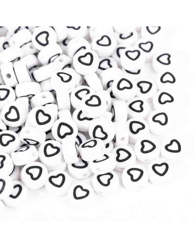 Corazón negro. Moneda blanca. 7 milímetros diámetro. 1,5 mm perforación. 100 unidades aproximado.