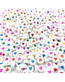 Corazón varios colores (sólido). Moneda blanca. 7 mm diámetro. 1,5 mm perforación. 100 uds aprox.