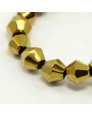 Bi-Cono. Electroplateado dorado. 4x4 milímetros. 1 mm perforación. 70 unidades hilo (aproximado).