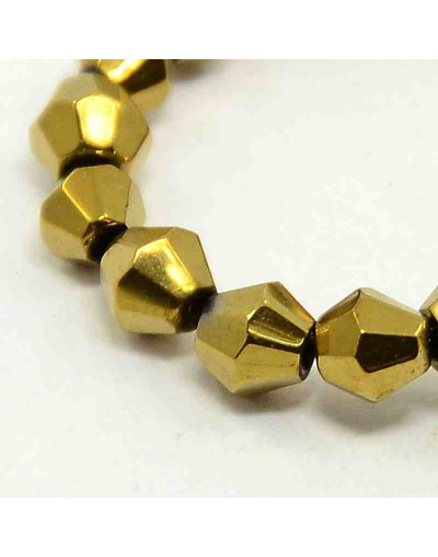 Bi-Cono. Electroplateado dorado. 4x4 milímetros. 1 mm perforación. 70 unidades hilo (aproximado).