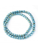 Opaco y brillante. Celeste y plateado verde. 4,5 milímetros. 1 mm perforación. 100 uds hilo (aprox) 