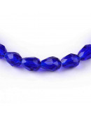 Gota faceteada. Azul. 8x6 milímetros. 1 mm perforación. 70 unidades hilo (aproximado). Gota faceteada. Azul. 8x6 milímetros. 1 mm perforación. 70 unidades hilo (aproximado).