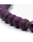 Esfera electroplateada. 08 mm diámetro. Púrpura escarchado. 1,5 mm perforación. 72 uds hilo (aprox).