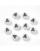 Letra negra. Vocales. Moneda fluorescente. 7 milímetros diámetro. 1,5 mm perforación. 100 uds aprox.