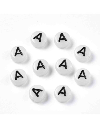 Letra negra. Vocales. Moneda fluorescente. 7 milímetros diámetro. 1,5 mm perforación. 100 uds aprox.