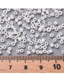 Color Sólido Lustrado. WHITE. 2 milímetros. 1 mm perforación. 40 gramos