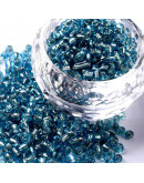 Cristal Línea Plateada. PALE TURQUOISE. 3 milímetros 1 mm perforación 40 gramos