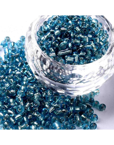 Cristal Línea Plateada. PALE TURQUOISE. 3 milímetros 1 mm perforación 40 gramos