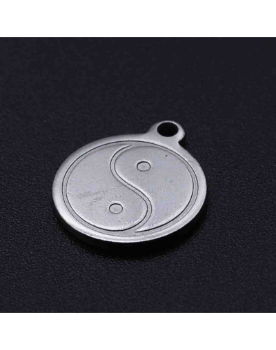 Yin-Yang. Acero inoxidable. Color plata antigua.14x12x1 mm.. 1,2 mm perforación. 1 unidad