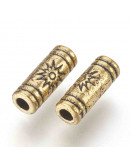 Tubo (4). Aleación de cobre. Color dorado. 9,5x3,5 milímetros. 1,5 mm perforación. 20 unidades.