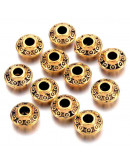 Tibetan beads Aleación de cobre Color dorado 6.5x3.5 mm 2 mm perforación 20 unidades