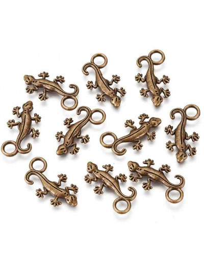 Gecko. Aleación de cobre. Color bronce antiguo. 22x12x2 mm. 3,5 mm perforación. 10 unidades Gecko. Aleación de cobre. Color bronce antiguo. 22x12x2 mm. 3,5 mm perforación. 10 unidades