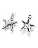 Estrella de mar. Aleacion de cobre. Color plata antigua. 16x12 milímetros. 1 mm perforación. 10 uds. Estrella de mar. Aleacion de cobre. Color plata antigua. 16x12 milímetros. 1 mm perforación. 10 uds.