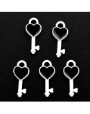 Corazón-Llave. Aleación de cobre y esmalte.16x7 milímetros. 1,8 mm perforación. 4 unidades Corazón-Llave. Aleación de cobre y esmalte.16x7 milímetros. 1,8 mm perforación. 4 unidades