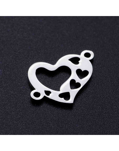 Corazones .Acero inoxidable. Color plateado. 12x17 milímetros 1,4 mm perforación. 1 unidad