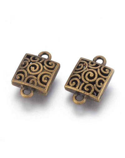 Enlace. Aleación. Color bronce antiguo. 23x15x8 milímetros. 2 mm perforación. 3 unidades