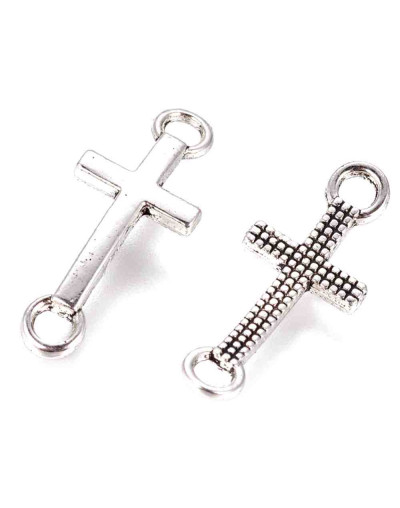 Cruz. Aleación de cobre. Color plateado. 20x8x2 milímetros. 2 mm perforación. 10 unidades.