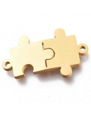 Puzzle. Acero inoxidable. Color dorado. 20x12x1 milímetro. 1,5 mm perforación. 1 unidad.