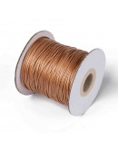 Cordón de poliester encerado. Piel de Serpiente. Color GOLD. 1 mm grosor. 80 metros cono.