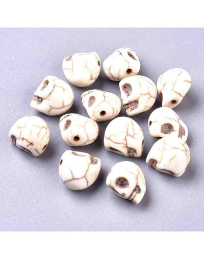 Howlite. Calaveras. Blanco hueso. 13x10x12 mm. 1 mm perforación. 15 unidades