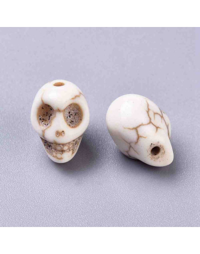 Howlite. Calaveras. Blanco hueso. 13x10x12 mm. 1 mm perforación. 15 unidades