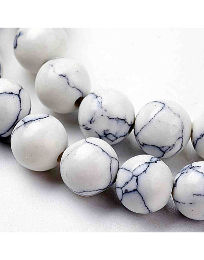 Howlite sintético. Blanco. 06 mm diámetro. 1 mm perforación. 60 unidades hilo (aproximado)