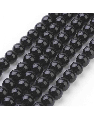 Piedra sintética. Negro brillante. 10 mm diámetro. 1 mm perforación. 35 unidades hilo (aproximado)