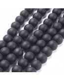 Piedra sintética. Negro mate. 10 mm diámetro. 1 mm perforación. 35 unidades hilo (aproximado)