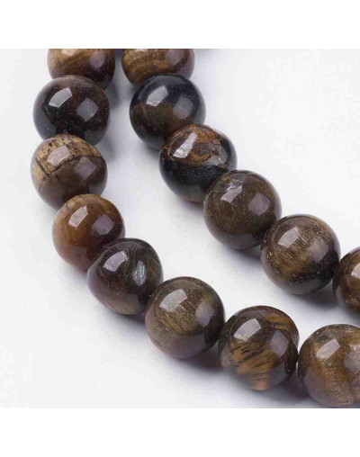 Ojo de Tigre. 10 mm diámetro. 1,20 mm perforación. 35 unidades hilo (aproximado)