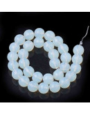 Opalina. Faceteada. 06 mm diámetro. 1 mm perforación. 100 unidades hilo (aproximado)