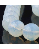 Opalina. Faceteada. 06 mm diámetro. 1 mm perforación. 100 unidades hilo (aproximado)