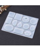 Moldes de silicona. Para resina. 12 formas diferentes. 153x114x8.5 millímetros. 1 unidad. Moldes de silicona. Para resina. 12 formas diferentes. 153x114x8.5 millímetros. 1 unidad.