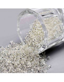 Chaquira. Cristal línea plateada. GLASS. 2 mm. 1 mm perforación. 40 gramos (2600 uds aprox)