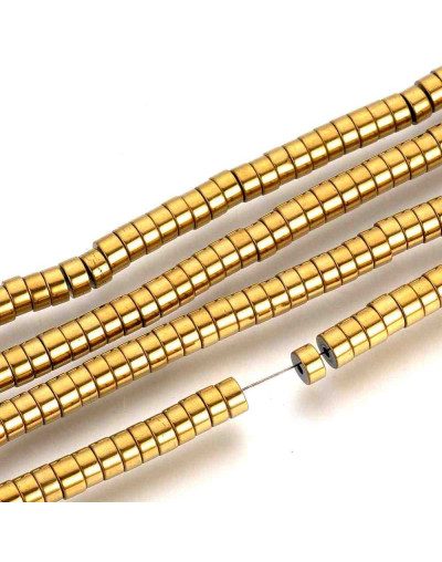 Hematite sintético. Heishi beads. Dorado. 4x2 milímetros. 1 mm perforación. 200 uds hilo aprox.