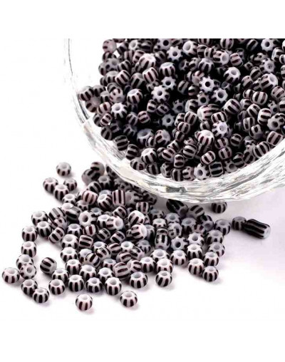 Color Sólido Bicolor. WHITE-BLACK. 2.5 milímetros 1 mm perforación 40 gramos 